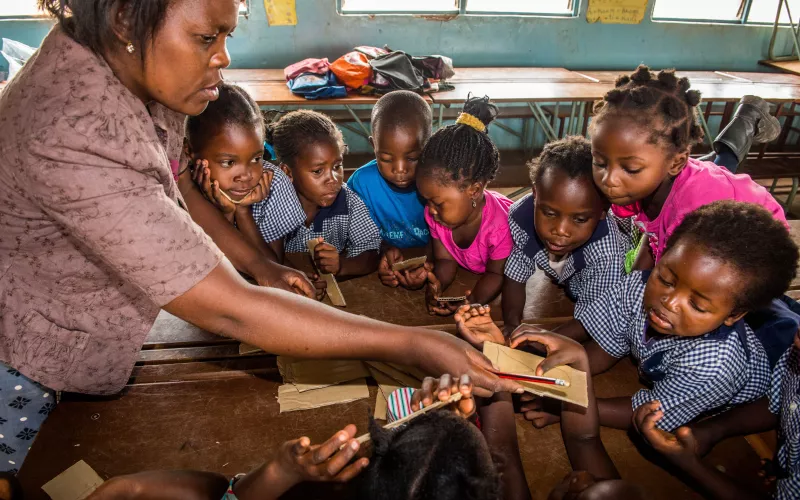 Teacher educating children