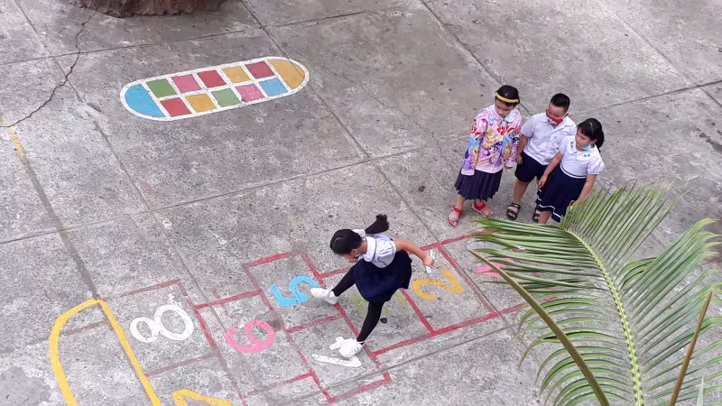 Chlidren playing hopscotch
