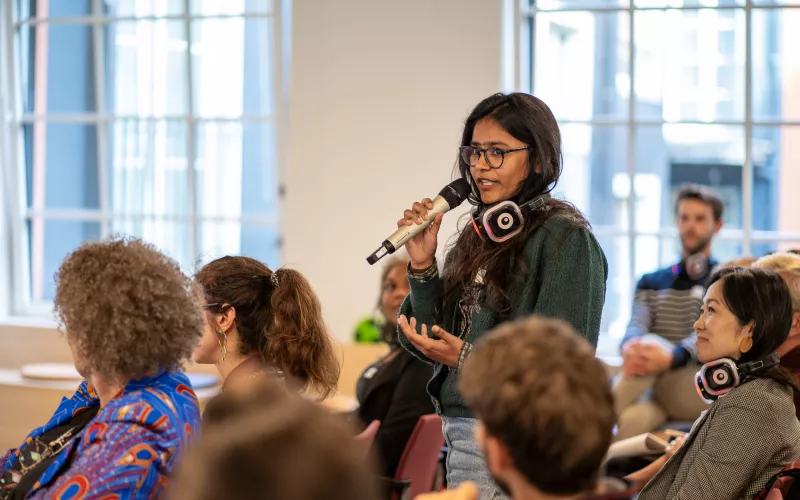 Lady speaking in microphone
