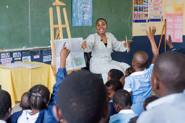 Female teacher lively interacting with her learners.