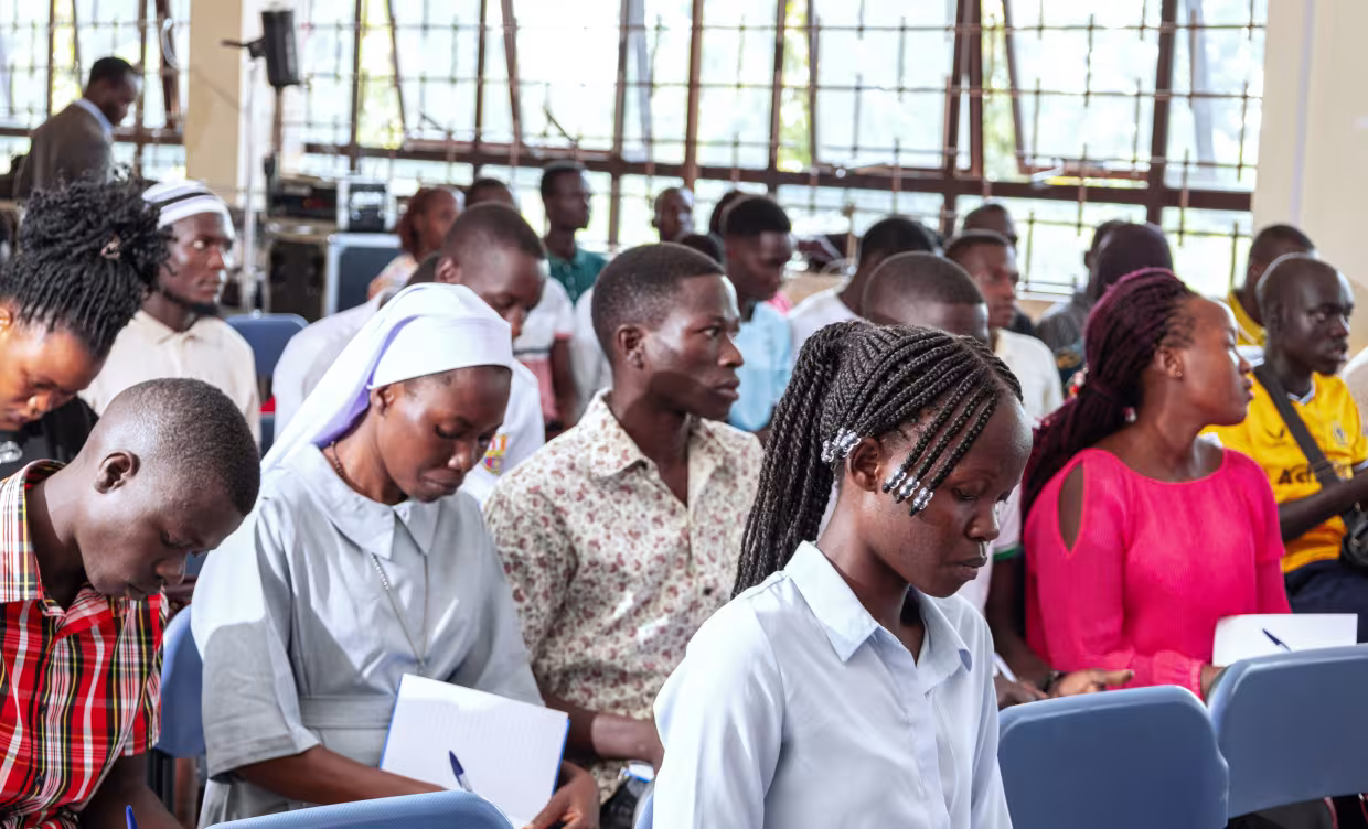 Students take notes attentively during a training session