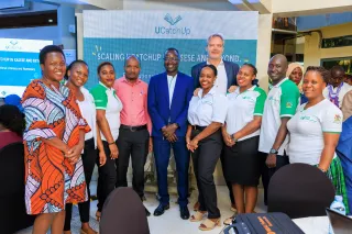A group photo of ten people smiling.