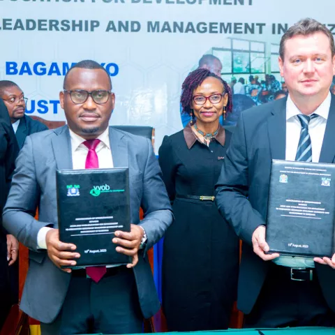 Colleauges from VVOB and ADEM pose for a signing agreement